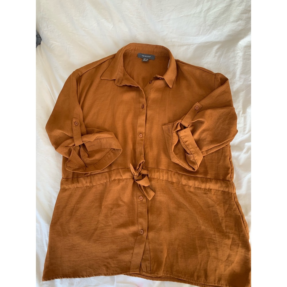 3/4 length rust coloured shirt